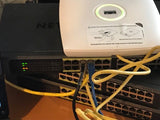 Netgear JGS524PE 24 port 10/100/1000 Switch, (12 PoE, 100W budget) NO Rack Mnts!