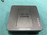 Cisco SPA112 2 port Phone Adapter with power supply.