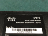 Cisco SPA112 2 port Phone Adapter with power supply.